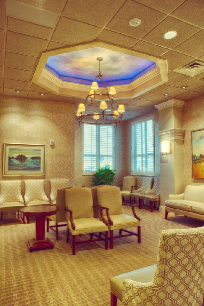 Waiting room with chandelier and painted ceiling at the Tanner Clinic Women's Center in Layton, Utah, built by PJF Corporation