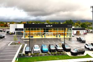 Drone view of the new Young Kia dealership in Layton, Utah, a ground-up auto dealership built by commercial contractor PJF Corporation