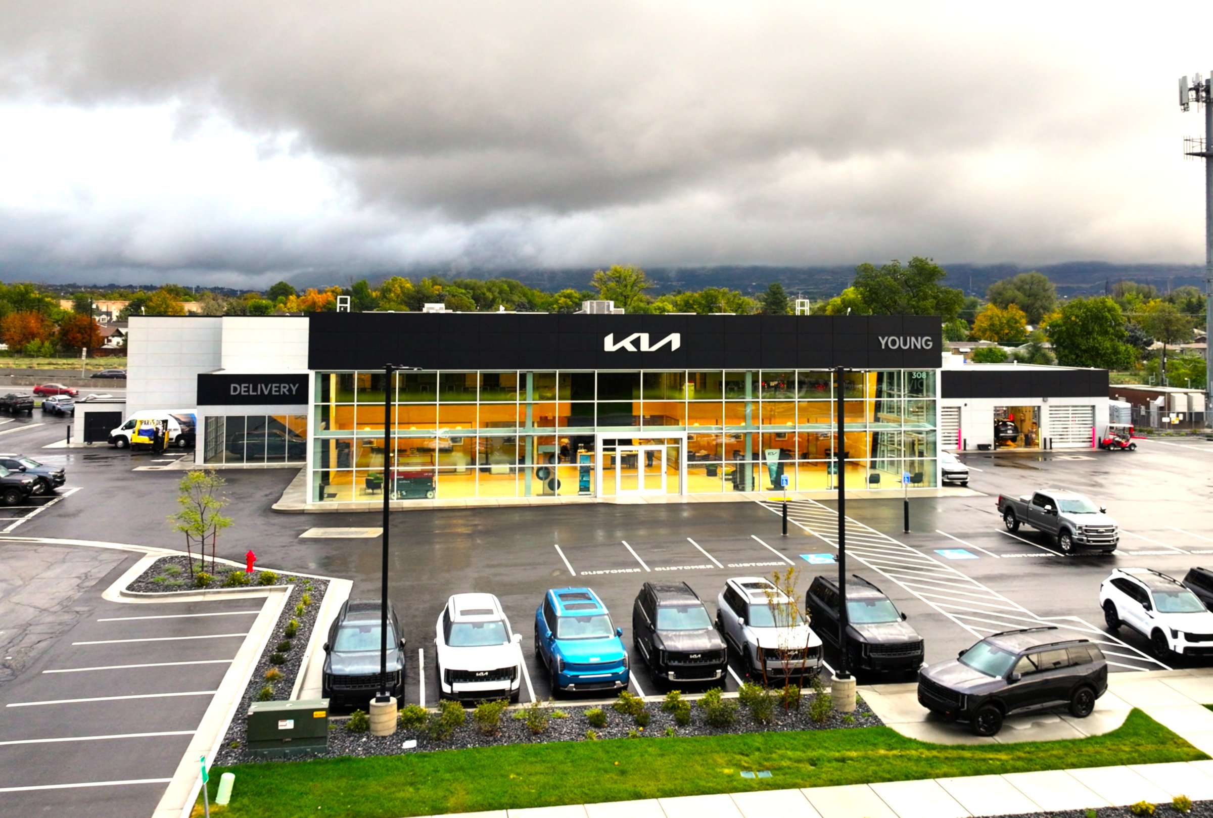 Drone view of the new Young Kia dealership in Layton, Utah, a ground-up auto dealership built by commercial contractor PJF Corporation